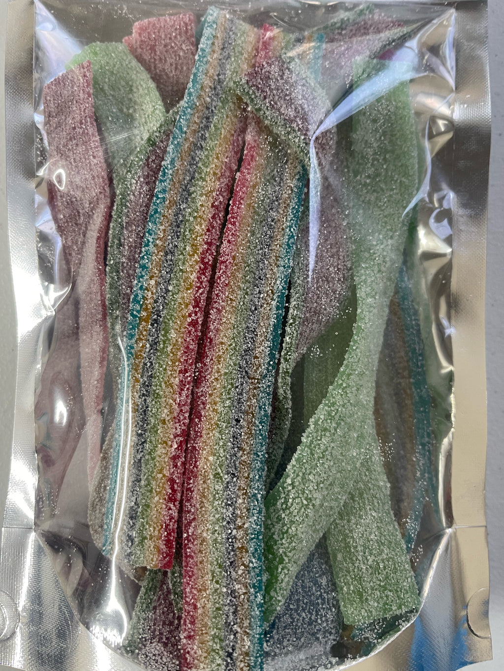 25 fizzy belts mixed in a sealed bag